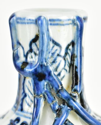 Lot 151 - YUAN DYNASTY CERAMIC ROULEAU VASE 青花釉里红缠枝花棒槌瓶