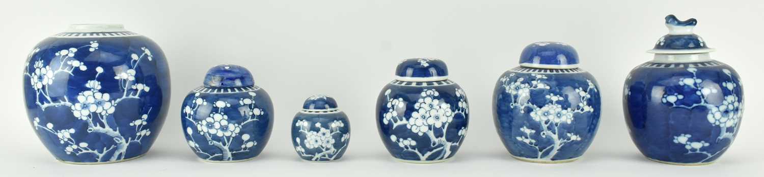 Lot 106 - GROUP OF SIX QING DYNASTY BLUE AND WHITE PRUNUS GINGER JARS 清 青花冰梅罐