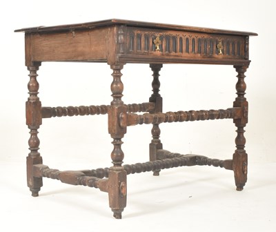 Lot 398 - 17TH CENTURY CARVED OAK PEG JOINTED WRITING TABLE DESK