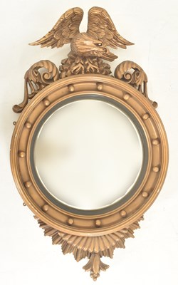 Lot 293 - 19TH CENTURY REGENCY STYLE GILT GESSO & WOOD CONVEX EAGLE MIRROR