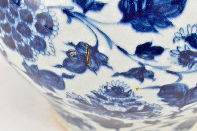 Lot 48 - MING BLUE AND WHITE 'PEONY' JAR 明 青花缠枝莲纹罐