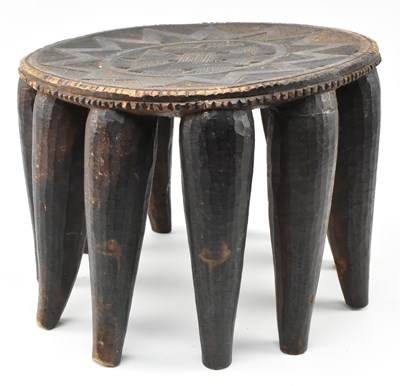 Lot 287 - NIGERIAN TRIBAL CARVED HARDWOOD NUPE STOOL WITH ELEVEN LEGS