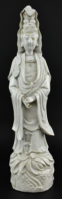 Lot 59 - QING DEHUA BLANC DE CHINE GUANYIN 清 德化白瓷观音立像