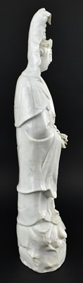 Lot 59 - QING DEHUA BLANC DE CHINE GUANYIN 清 德化白瓷观音立像