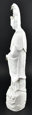 Lot 59 - QING DEHUA BLANC DE CHINE GUANYIN 清 德化白瓷观音立像