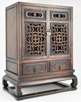 Lot 118 - HUANGHULI WOOD OPEN WORK TABLE CABINET 黄花梨双门桌柜