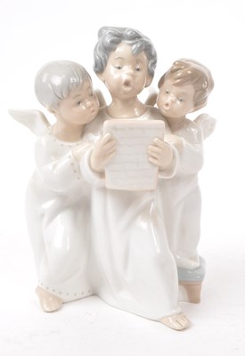 Lot 65 - LLADRO - TWO HAND MADE SPANISH PORCELAIN CHERUB FIGURINES