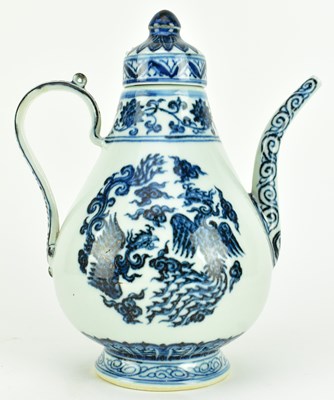 Lot 101 - MING XUANDE MARKED BLUE AND WHITE "PHOENIXES" EWER 宣德款 青花凤纹执壶