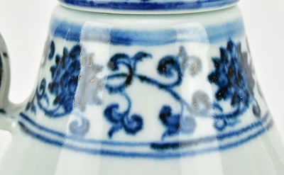Lot 101 - MING XUANDE MARKED BLUE AND WHITE "PHOENIXES" EWER 宣德款 青花凤纹执壶