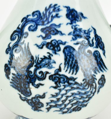 Lot 101 - MING XUANDE MARKED BLUE AND WHITE "PHOENIXES" EWER 宣德款 青花凤纹执壶