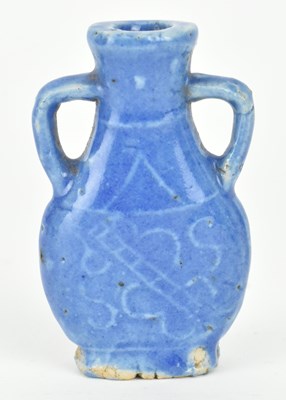 Lot 76 - TWO QING DYNASTY CERAMIC SNUFF BOTTLES 清 青花鼻烟壶和蓝釉鼻烟壶