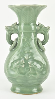 Lot 50 - YUAN OR LATER CELADON BRONZE SHAPED VASE 元 青釉兽耳双环瓶瓶