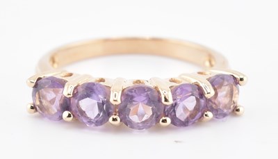 Lot 334 - HALLMARKED 9CT GOLD & AMETHYST FIVE STONE RING