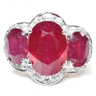 Lot 51a - 18CT WHITE GOLD RUBY & DIAMOND HALO RING