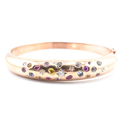 Lot 49a - HALLMARKED 9CT ROSE GOLD GEM SET HINGED BOMBE BANGLE