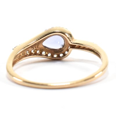 Lot 498 - HALLMARKED 9CT GOLD TANZANITE & WHITE STONE RING