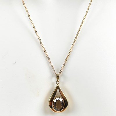 Lot 367 - GOLD & SMOKY QUARTZ PENDANT NECKLACE & BRACELET