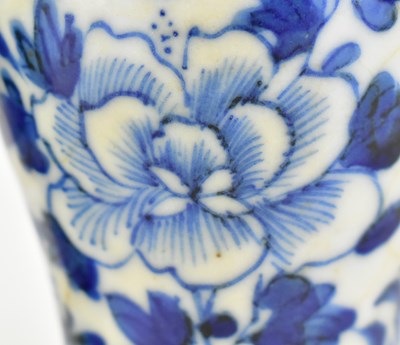 Lot 41 - PAIR OF QING NANKING BLUE AND WHITE MINIATURE VASES 清 仿哥窑青花花鸟小瓶一对