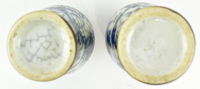 Lot 41 - PAIR OF QING NANKING BLUE AND WHITE MINIATURE VASES 清 仿哥窑青花花鸟小瓶一对