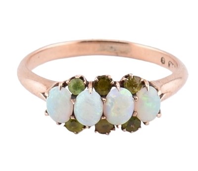 Lot 427 - 9CT ROSE GOLD OPAL & GARNET FOUR STONE CLUSTER RING