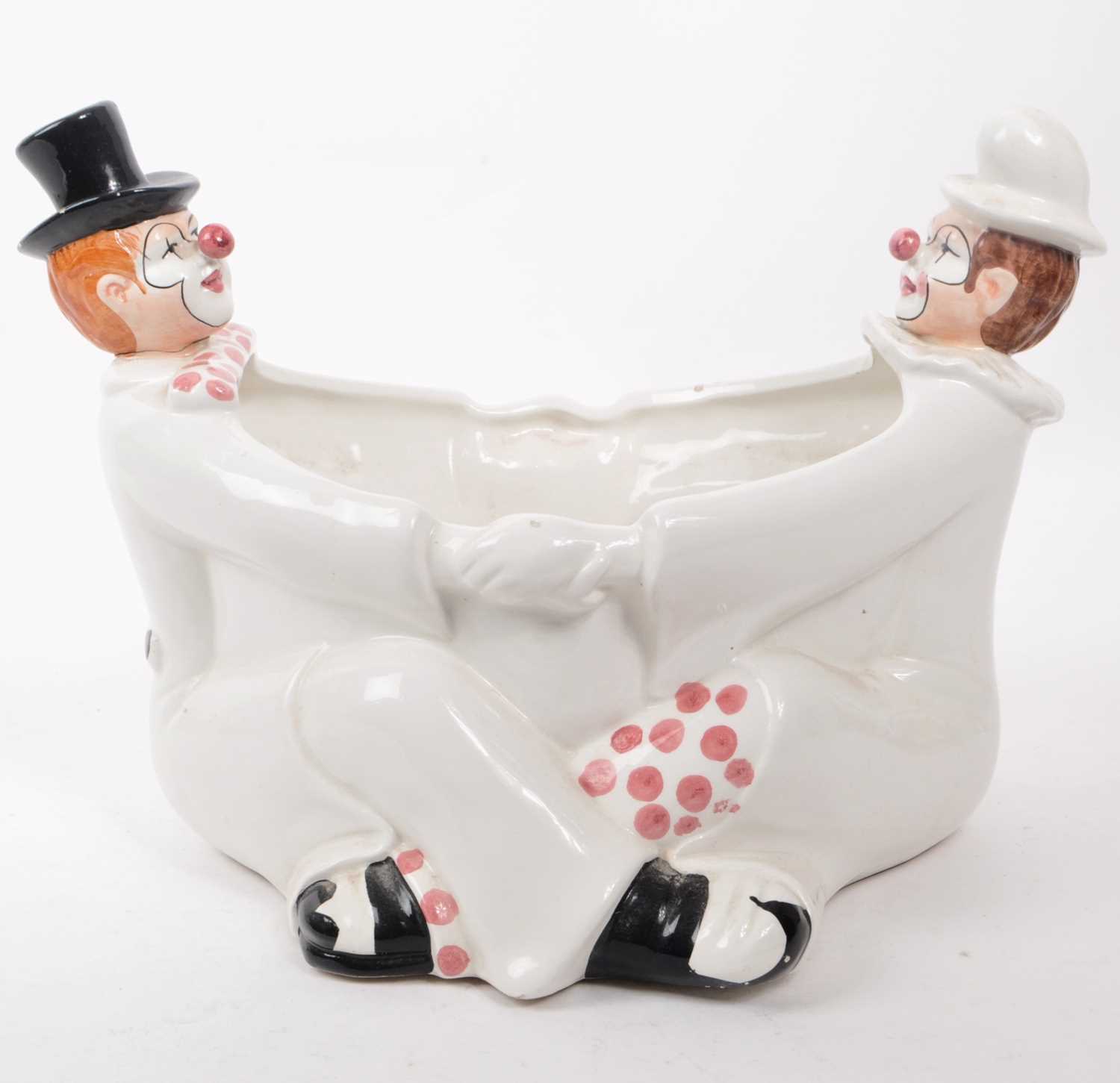Lot 74 - MID 20TH CENTURY ITALIAN CERAMIC CLOWN PLANT POT