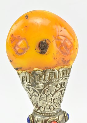 Lot 17 - TIBETAN SILVER COLOURED METAL AND COPAL RESIN SEAL
