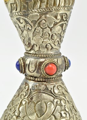 Lot 17 - TIBETAN SILVER COLOURED METAL AND COPAL RESIN SEAL
