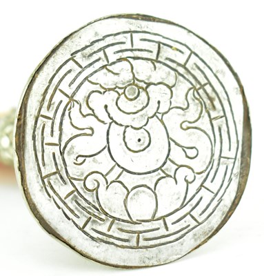 Lot 17 - TIBETAN SILVER COLOURED METAL AND COPAL RESIN SEAL