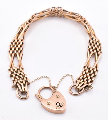 Lot 57 - 9CT ROSE GOLD GATE LINK BRACELET WITH HEART PADLOCK CLASP